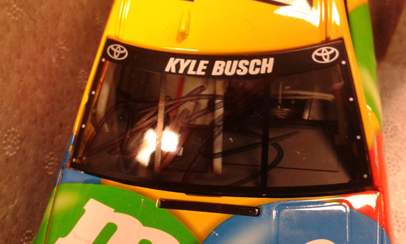 I know it’s hard to see but there is a signed autograph by Kyle Busch on the windshield.